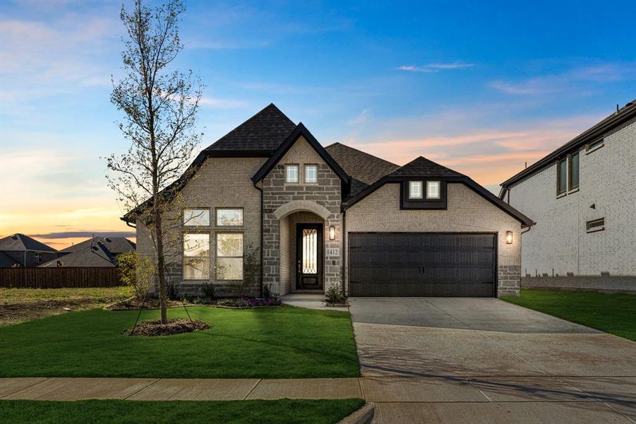 Front exterior of a new home in ArrowBrooke Classic 50, Aubrey, TX, highlighting curb appeal (Image 1).
