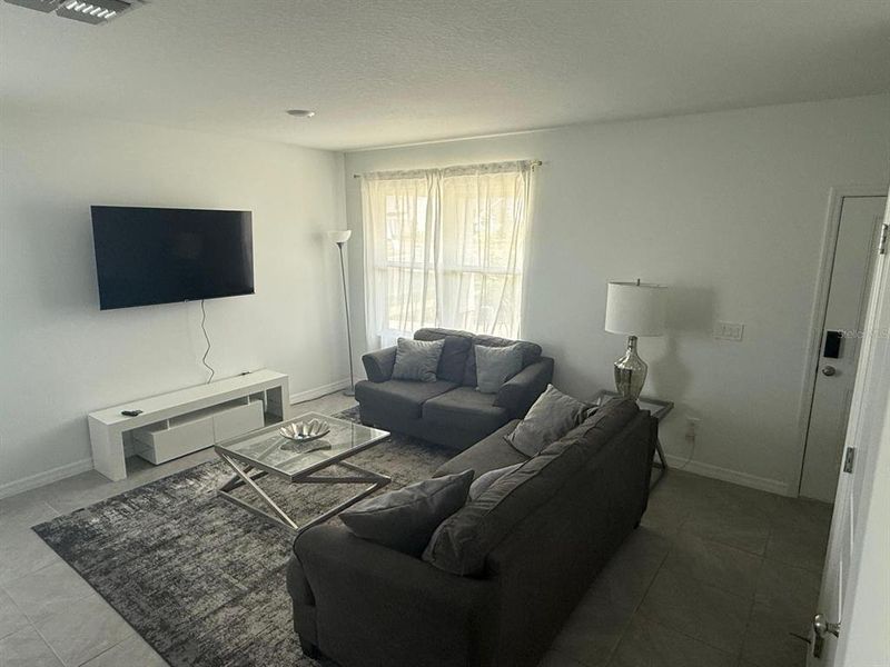 Furnished interior view inside a new home in , Winter Garden (Image 3).
