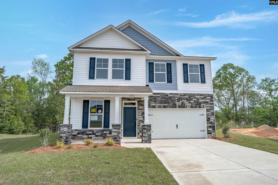 Front exterior of a new home in Rolling Hills, Prosperity, SC, highlighting curb appeal (Image 19). Front exterior of a new home in Rolling Hills, Prosperity, SC, highlighting curb appeal (Image 19).