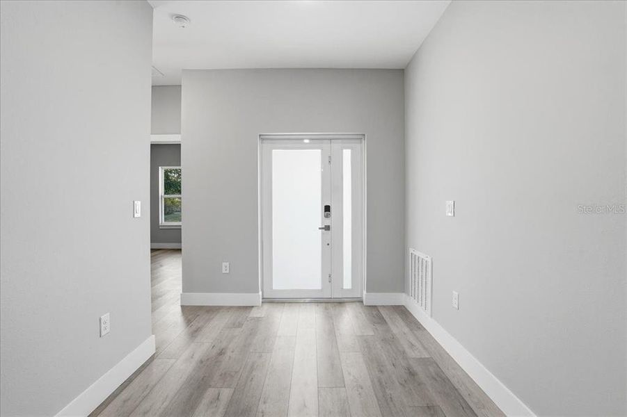 Spacious, unfurnished interior of a new home in , Port Charlotte (Image 23).