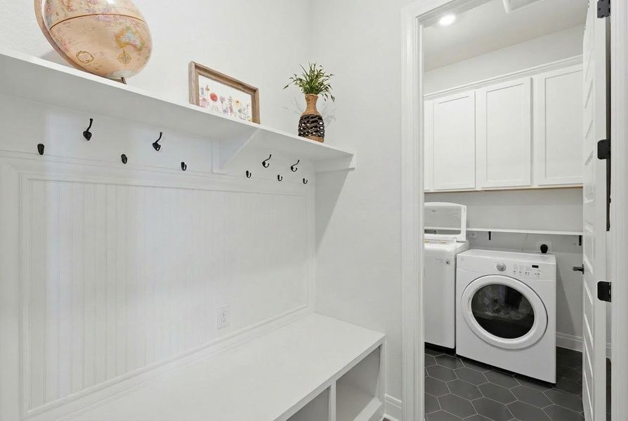 A well-appointed laundry area offers seamless functionality and crisp design. A well-appointed laundry area offers seamless functionality and crisp design.