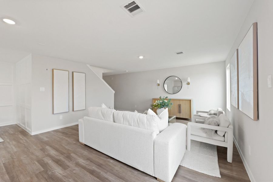 Furnished interior view inside a new home in Sunterra, Katy (Image 17).