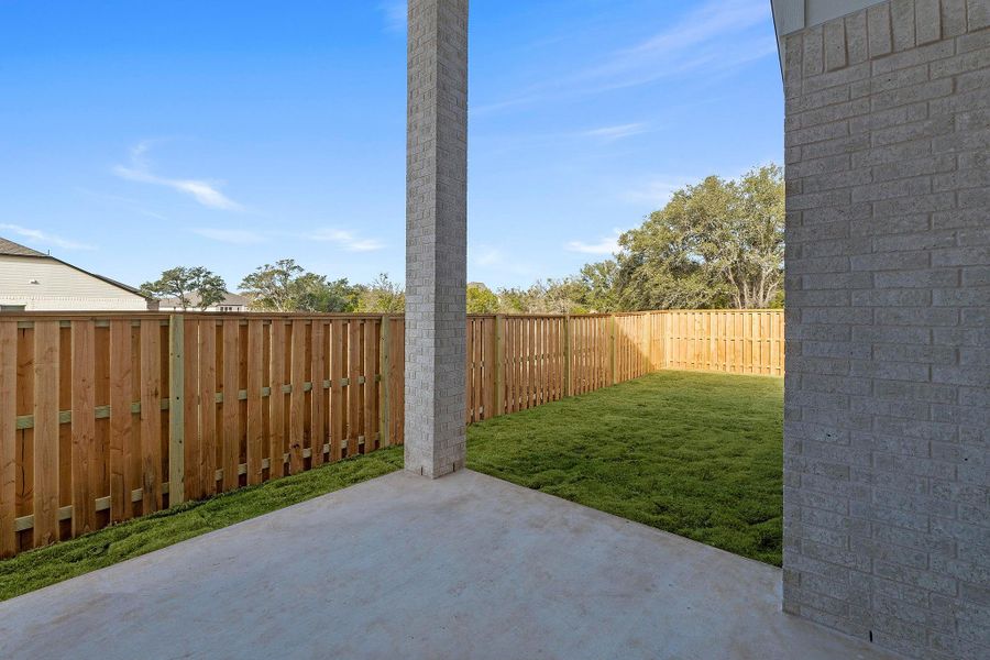 Exterior details and patio area of a home in Parmer Ranch, Georgetown (Image 4).