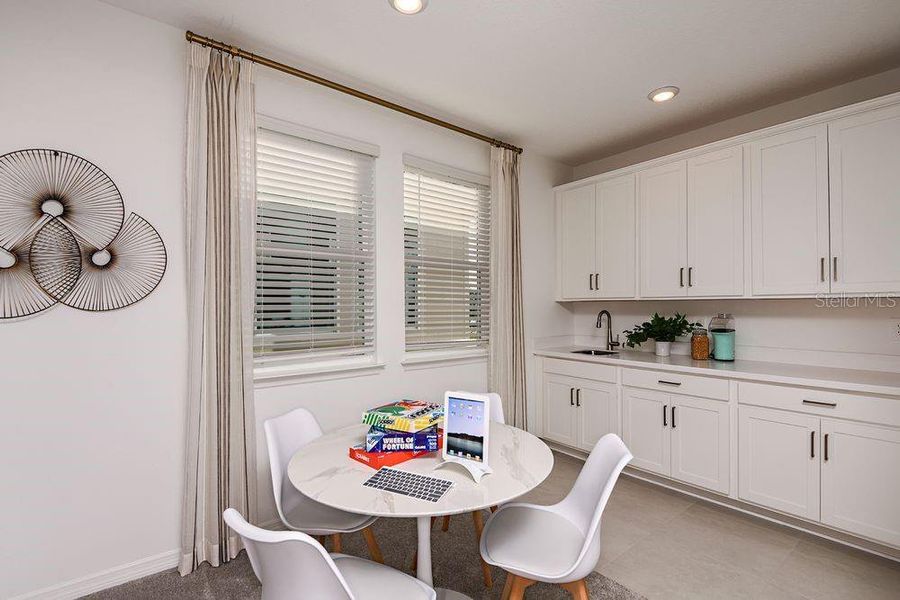 Furnished interior view inside a new home in Harvest at Ovation, Winter Garden (Image 25).