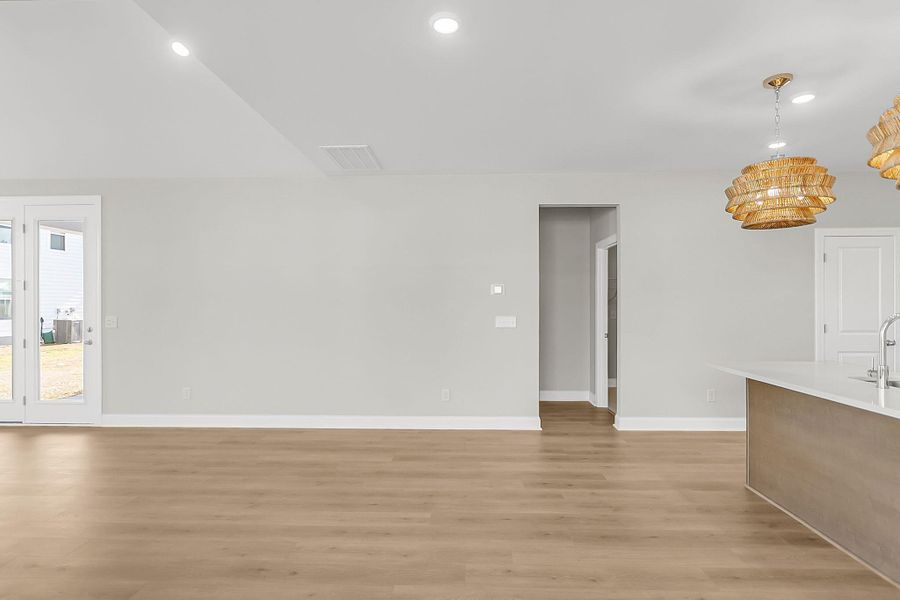 Spacious, unfurnished interior of a new home in Tidewater at Lakes of Cane Bay, Summerville (Image 21).