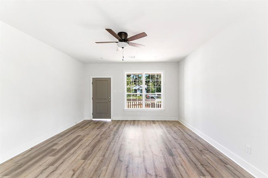 Another view of the family room w/ceiling fan.