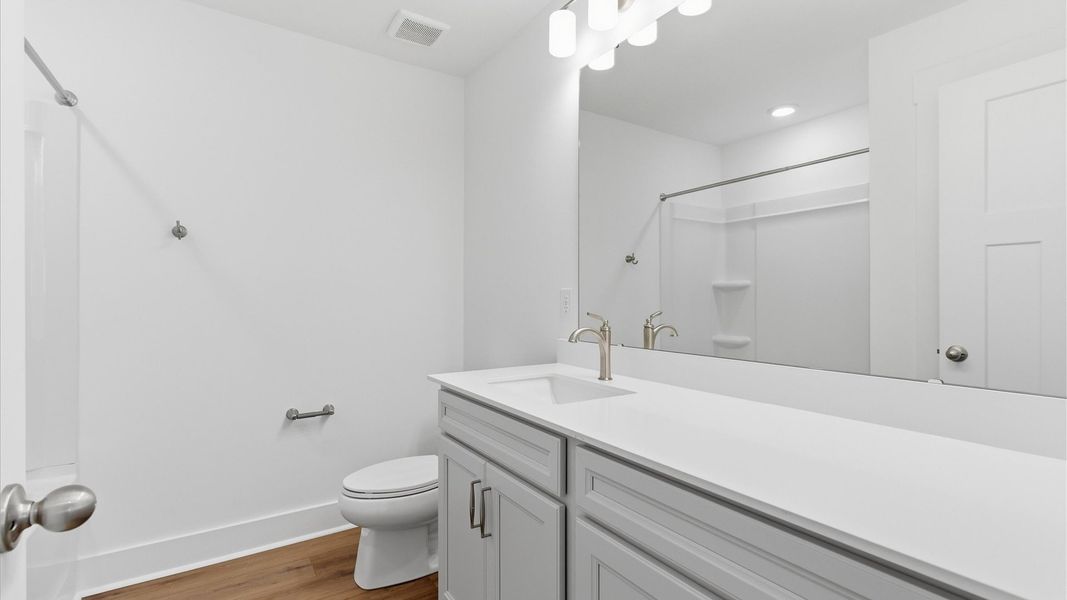 Furnished interior view inside a new home in Village at Midway, Anderson (Image 28).