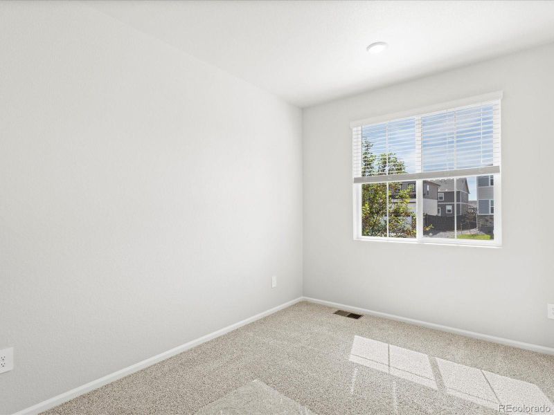 Spacious, unfurnished interior of a new home in Westgate, Greeley (Image 24).