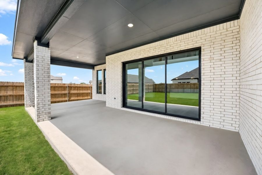Exterior details and patio area of a home in Santa Rita Ranch, Liberty Hill (Image 19).