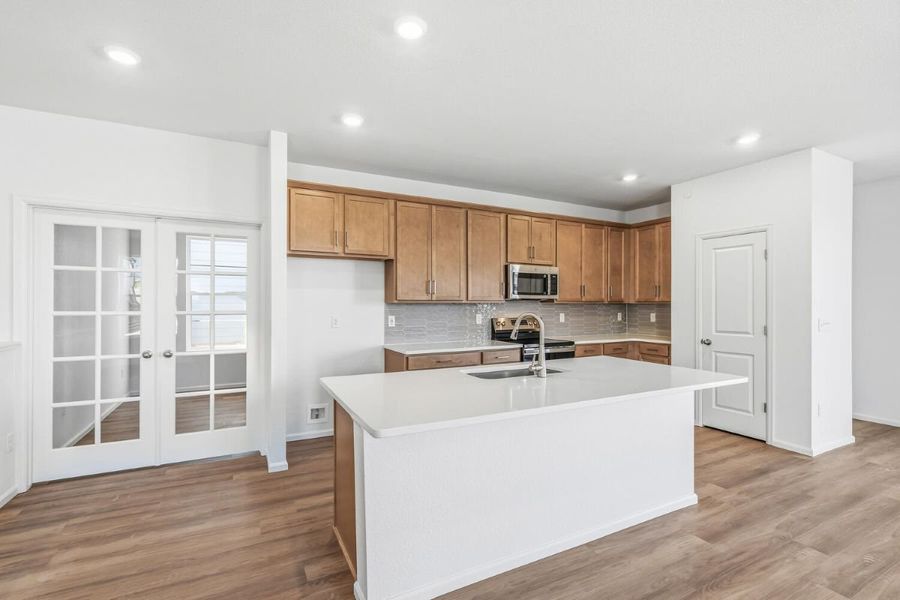 Furnished interior view inside a new home in Legato, Commerce City (Image 5).