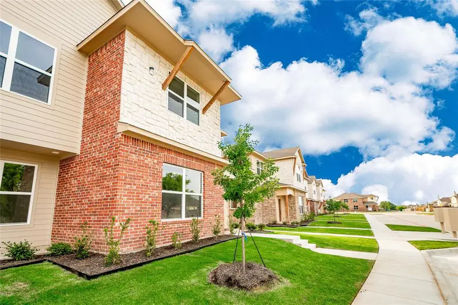 Exterior details and patio area of a home in , Denton (Image 4).