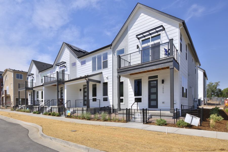 Front exterior of a new home in Loretto Heights - Rise Collection, Denver, CO, highlighting curb appeal (Image 1).