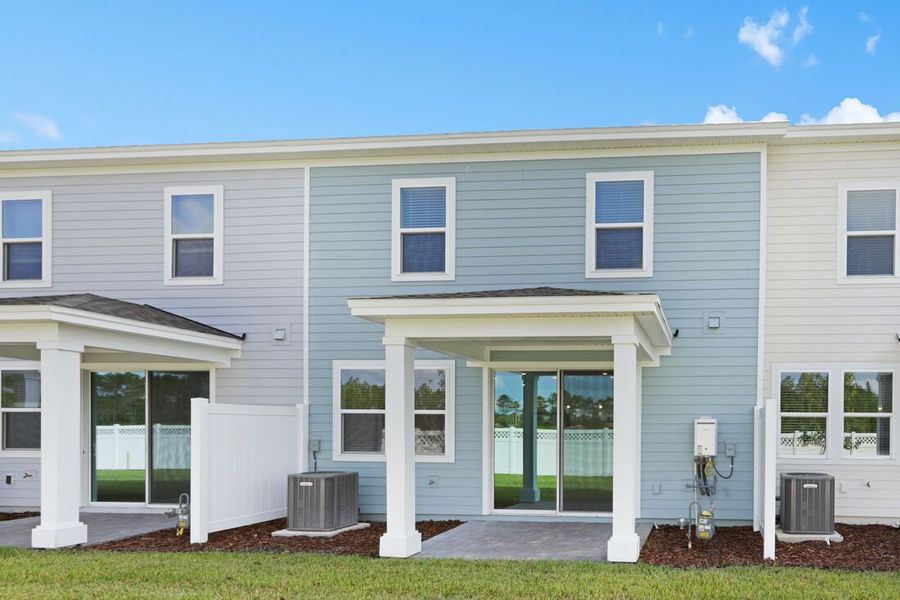 Exterior details and patio area of a home in Cherry Elm at SilverLeaf, St. Augustine (Image 18).