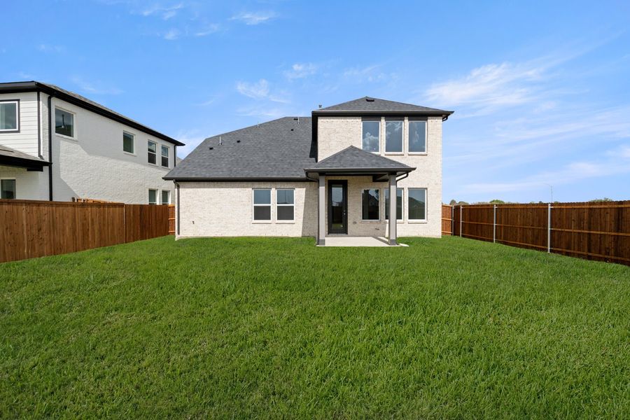 Exterior details and patio area of a home in Wildflower Ranch, Fort Worth (Image 3).