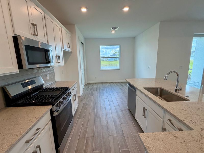 Representative furnished interior of a home built from the Juno by William Ryan Homes in The Sanctuary – Resort Collection, Punta Gorda (Image 7).