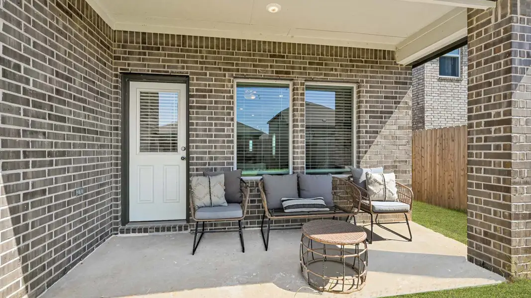 Exterior details and patio area of a home in Emberly, Beasley (Image 3).