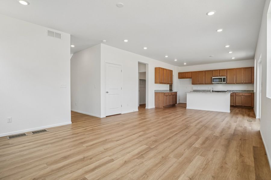 Spacious, unfurnished interior of a new home in The Cottages Collection at Ridgeline Vista, Brighton (Image 12).