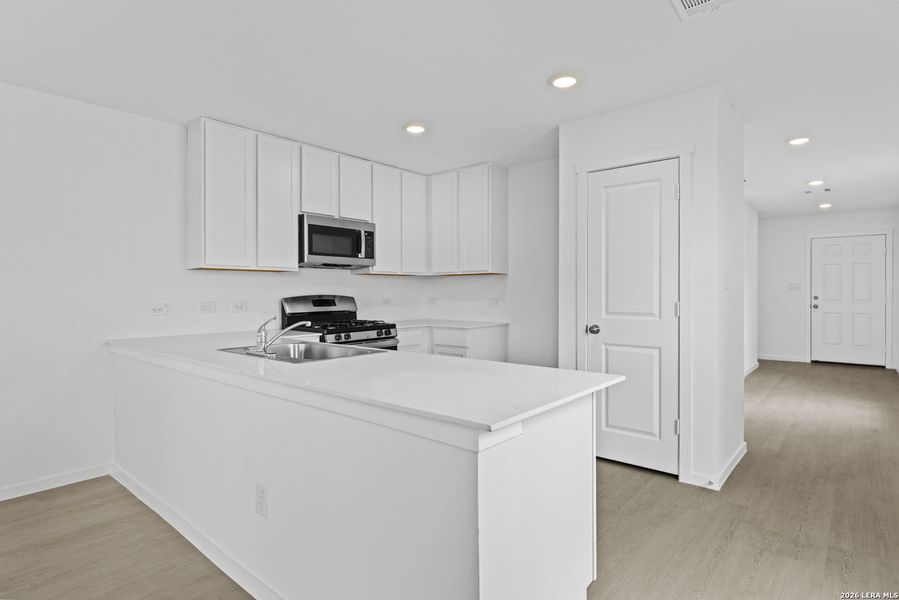 Furnished interior view inside a new home in Spring Grove, St. Hedwig (Image 6).