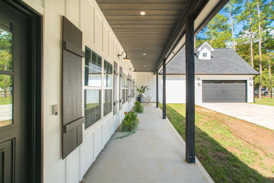 A charming front porch, ready to greet you A charming front porch, ready to greet you