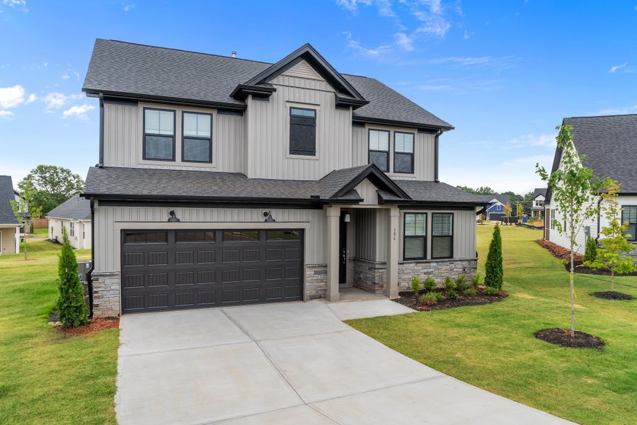 Representative exterior photo of a completed home built from the Callaham by Hunter Quinn Homes in Autumn Mill, Seneca, SC (Image 19). Representative exterior photo of a completed home built from the Callaham by Hunter Quinn Homes in Autumn Mill, Seneca, SC (Image 19).
