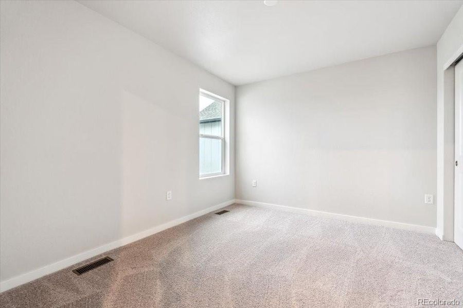 Spacious, unfurnished interior of a new home in Legato, Commerce City (Image 17).