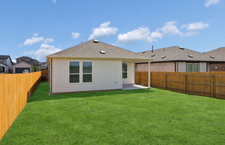 Exterior details and patio area of a home in Crosswinds, Kyle (Image 21).