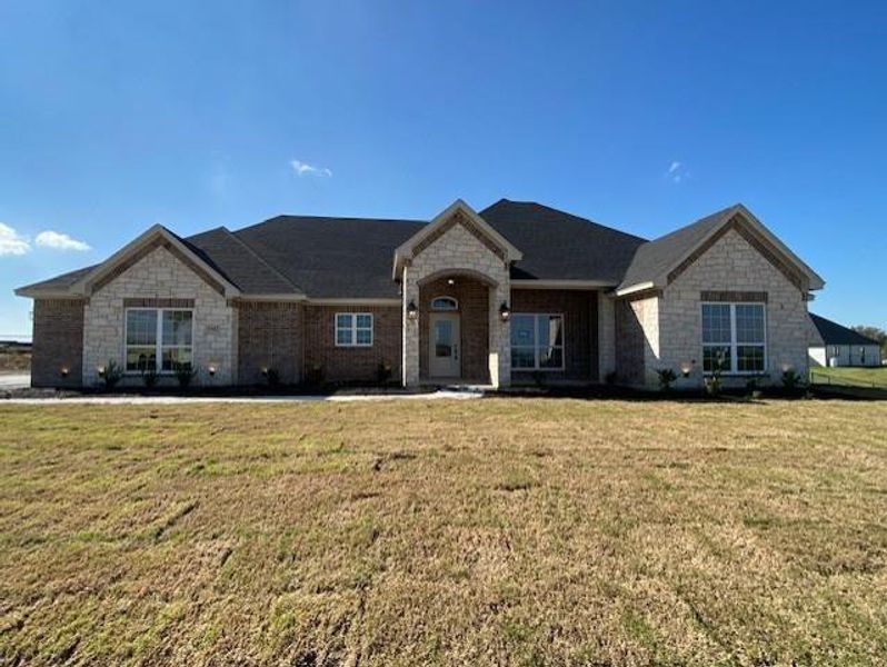 Exterior details and patio area of a home in , Azle (Image 1).