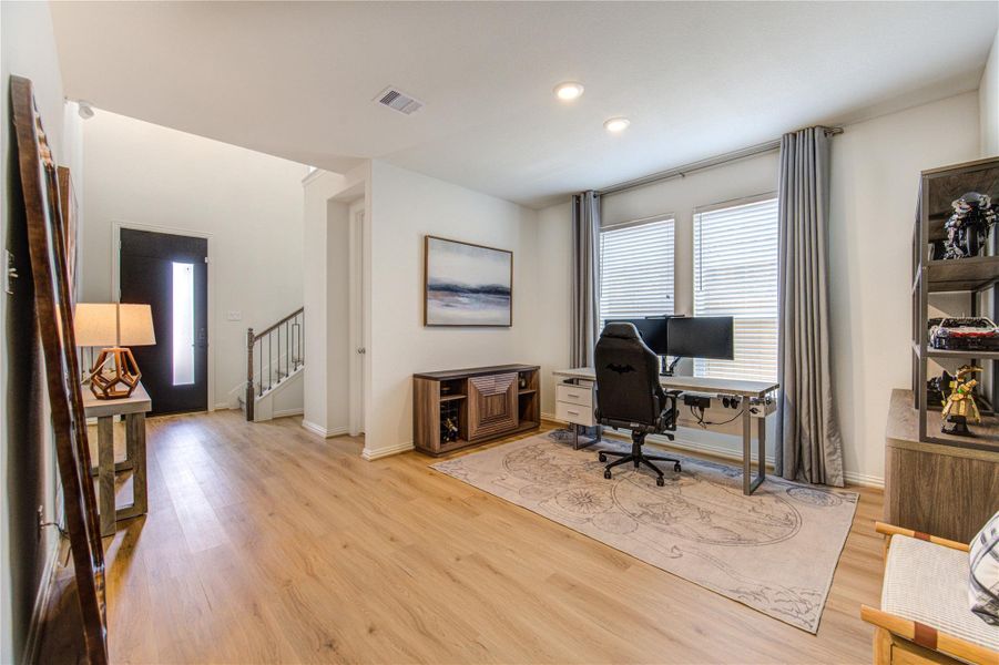 Dining room being used as a home office.