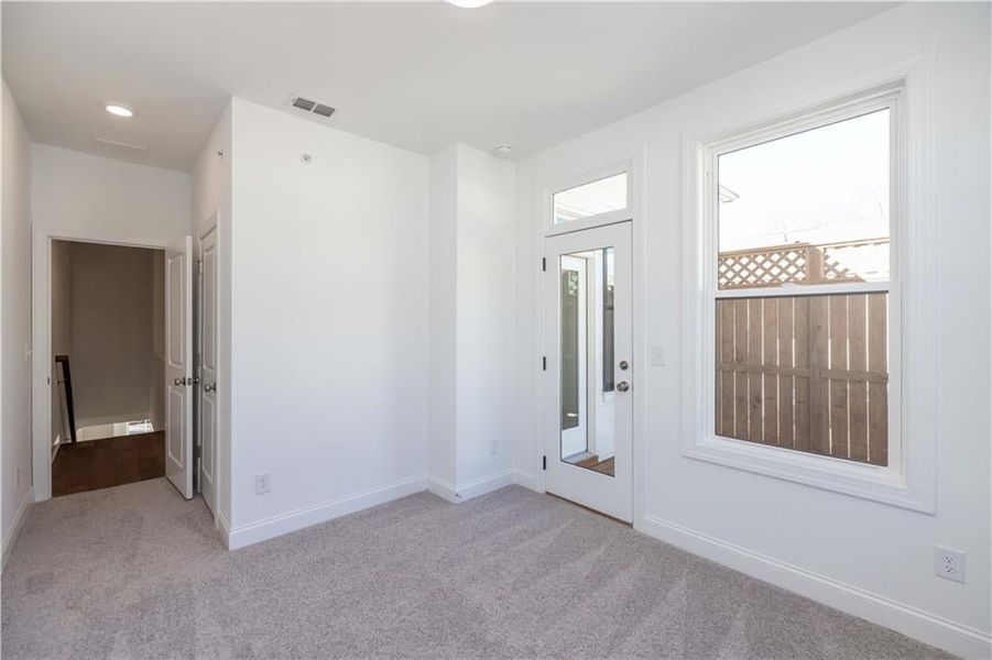 The 3rd bedroom also has access to the shared deck on the upper floor.