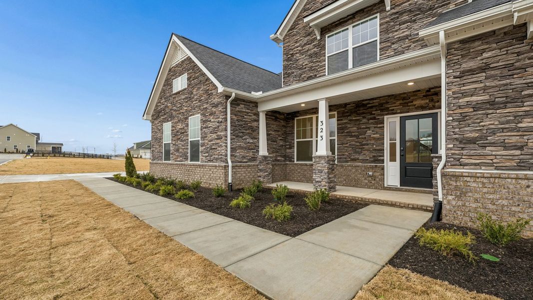 Representative exterior details of a home built from the Tisdale by D.R. Horton in Harvest Point, Spring Hill (Image 3). Representative exterior details of a home built from the Tisdale by D.R. Horton in Harvest Point, Spring Hill (Image 3).