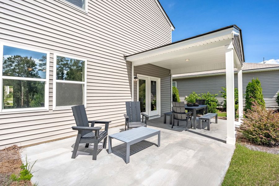 Exterior details and patio area of a home in Grand Arbor, Blythewood (Image 32).
