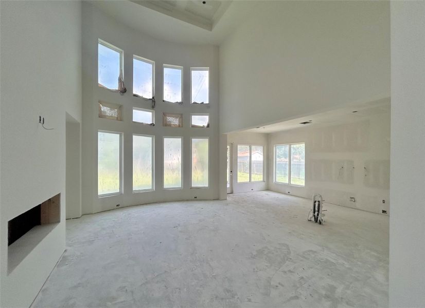 Open-Concept Kitchen Flowing Seamlessly Into the Living Area. Construction Photo as of  5/20/2026
