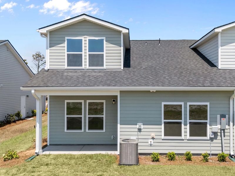 Exterior details and patio area of a home in Blue Heron Retreat, Little River (Image 4).