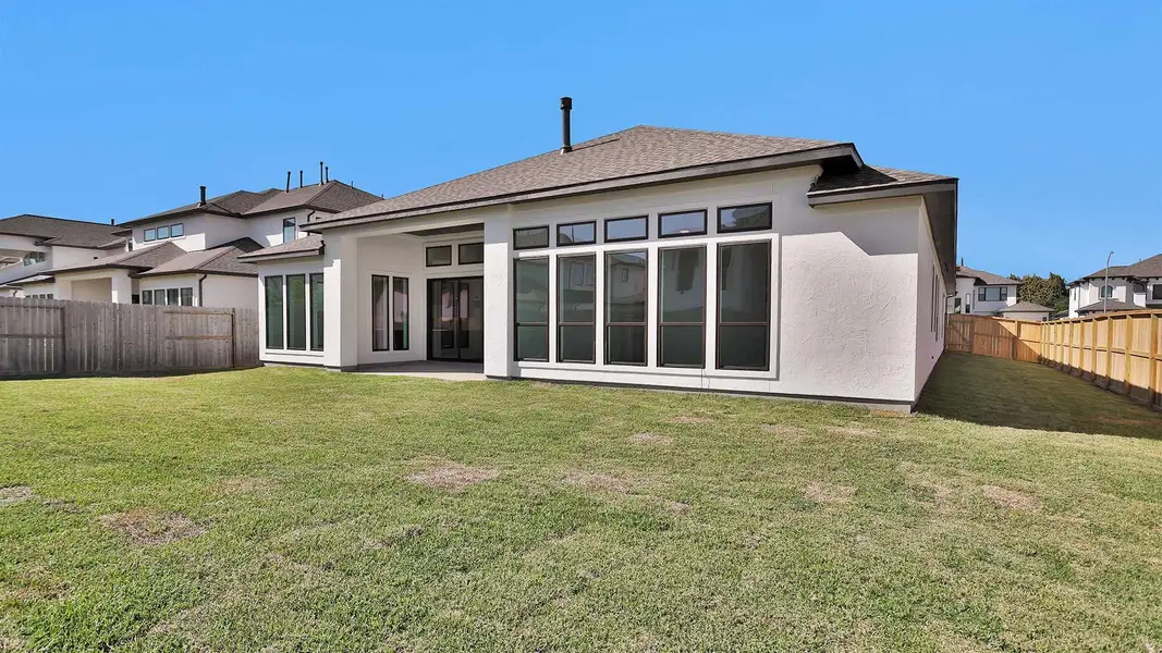 Exterior details and patio area of a home in Sienna 65' - Valencia, Missouri City (Image 3). Exterior details and patio area of a home in Sienna 65' - Valencia, Missouri City (Image 3).