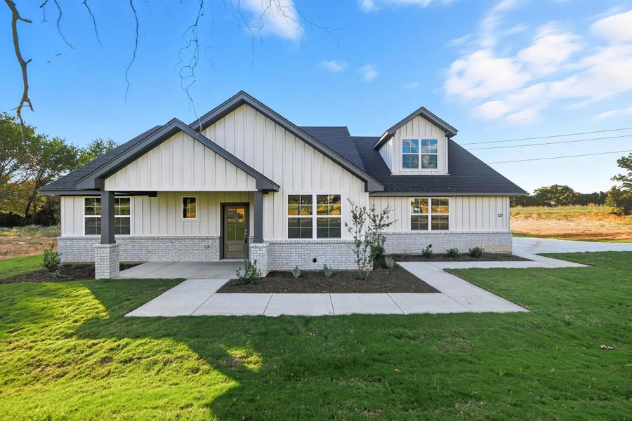 Representative exterior photo of a completed home built from the Garrison III by Cheldan Homes in Arbor Oaks, Boyd, TX (Image 18).