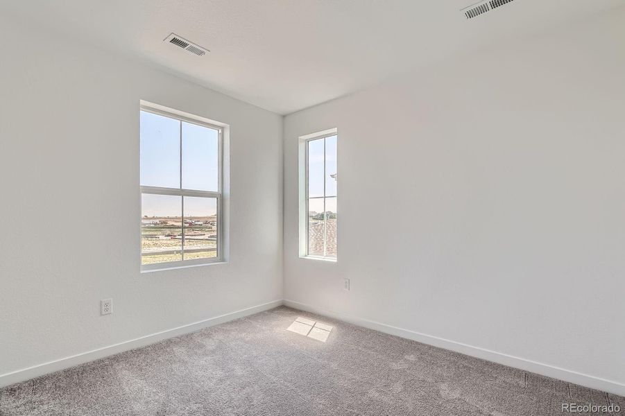 Spacious, unfurnished interior of a new home in Eastcreek Farm: Paired Homes, Thornton (Image 10).
