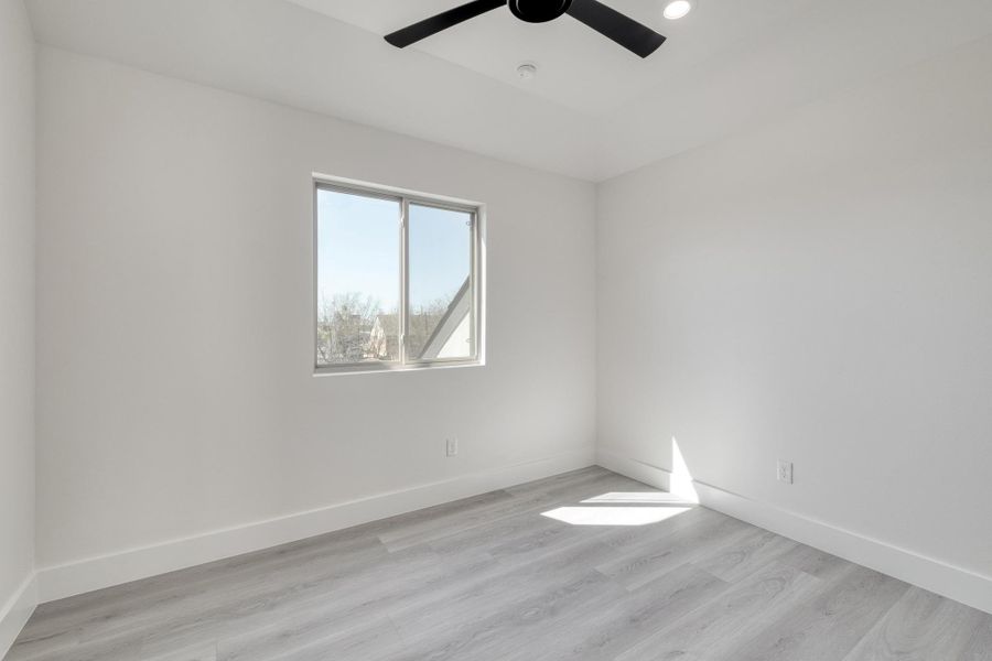 Unfurnished room with recessed lighting, baseboards, light wood finished floors, and ceiling fan