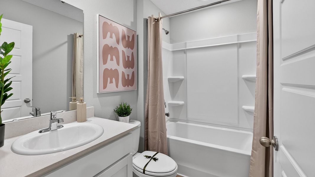 Representative furnished interior of a home built from the Carson by D.R. Horton in Hansen Creek, Jacksonville (Image 22).