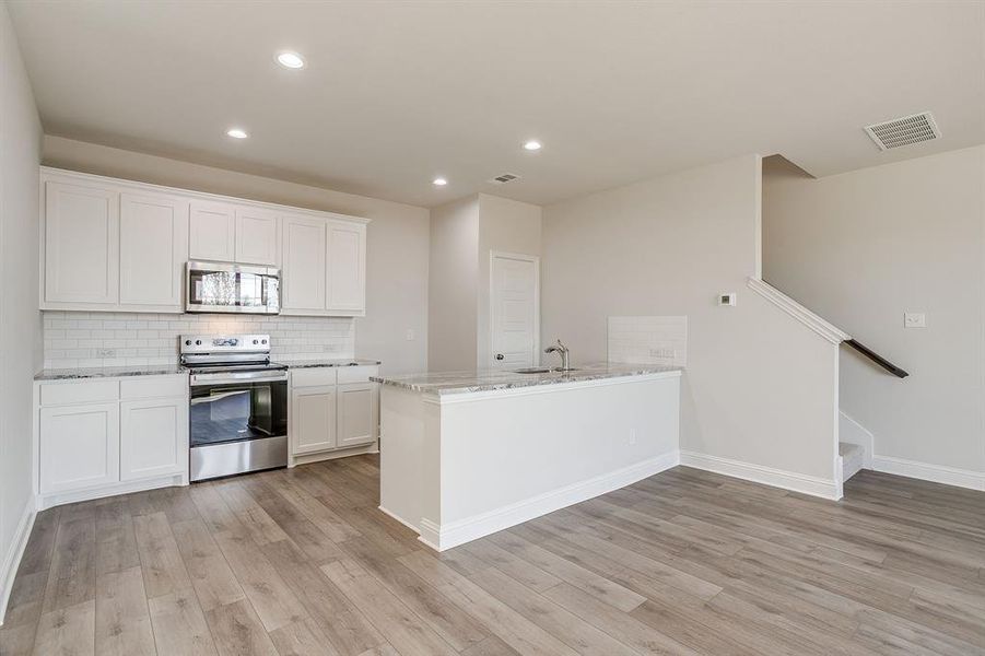 Furnished interior view inside a new home in Knight's Landing on Eden Road, Arlington (Image 11).