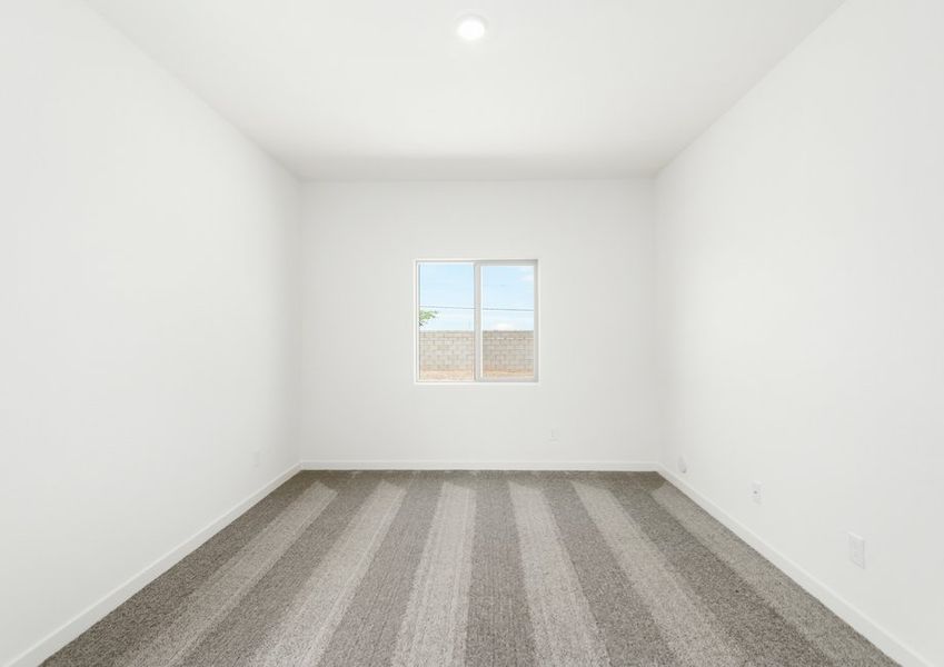 The master bedroom is filled with natural lighting.