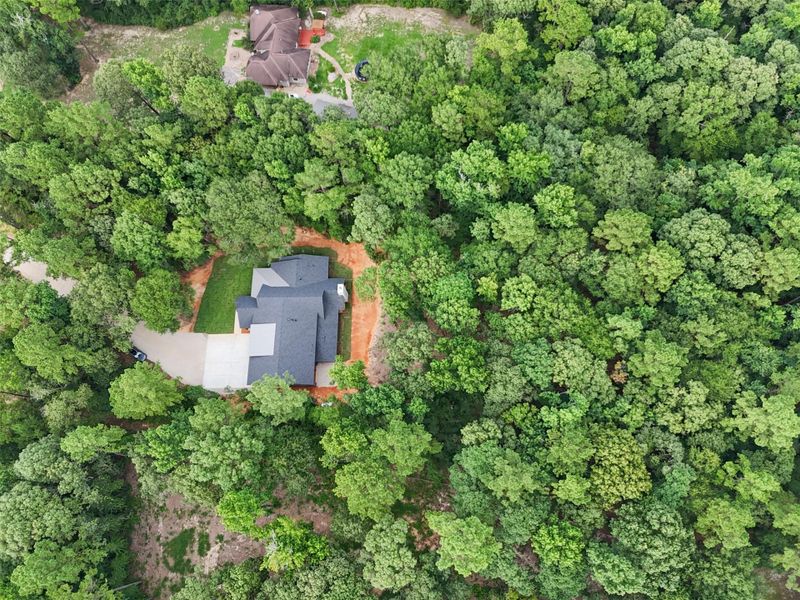 Front exterior of a new home in , Willis, TX, highlighting curb appeal (Image 25). Front exterior of a new home in , Willis, TX, highlighting curb appeal (Image 25).