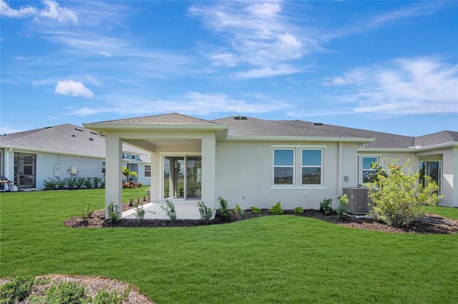 Exterior details and patio area of a home in Gracewater at Sarasota, Sarasota (Image 4).