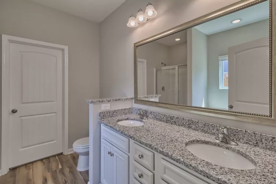 Representative furnished interior of a home built from the Dahlia II by Great Southern Homes in Camellia Park, Thomson (Image 9).
