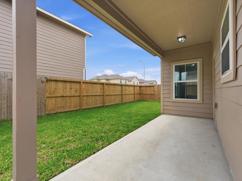 Enjoy outdoor living with a covered back patio that extends your living space and creates the perfect setting for relaxing or entertaining.