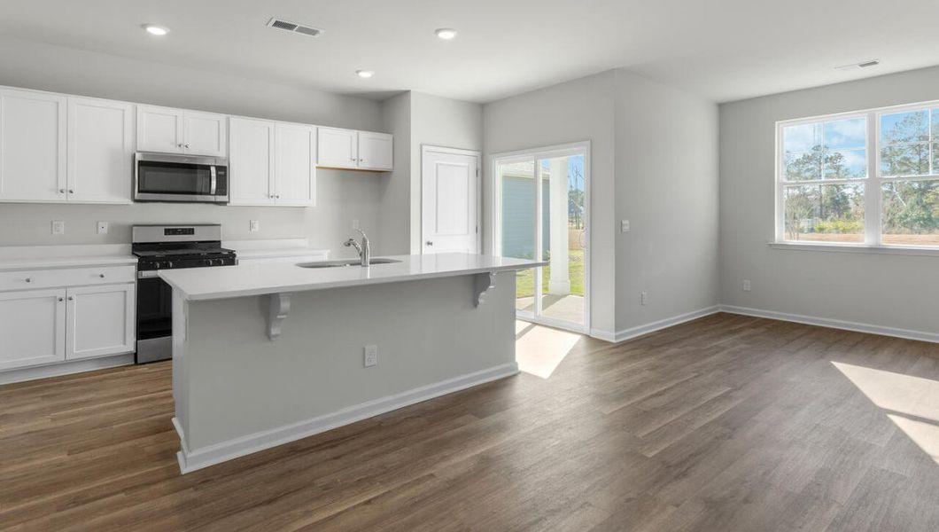 Representative furnished interior of a home built from the KERRY by D.R. Horton in Cedar Hill Landing, Navassa (Image 4).