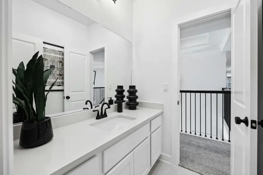 Furnished interior view inside a new home in Wolf Ranch, Georgetown (Image 29).