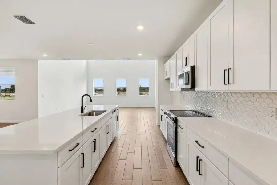 Furnished interior view inside a new home in Northlake at Ovation, Winter Garden (Image 8).