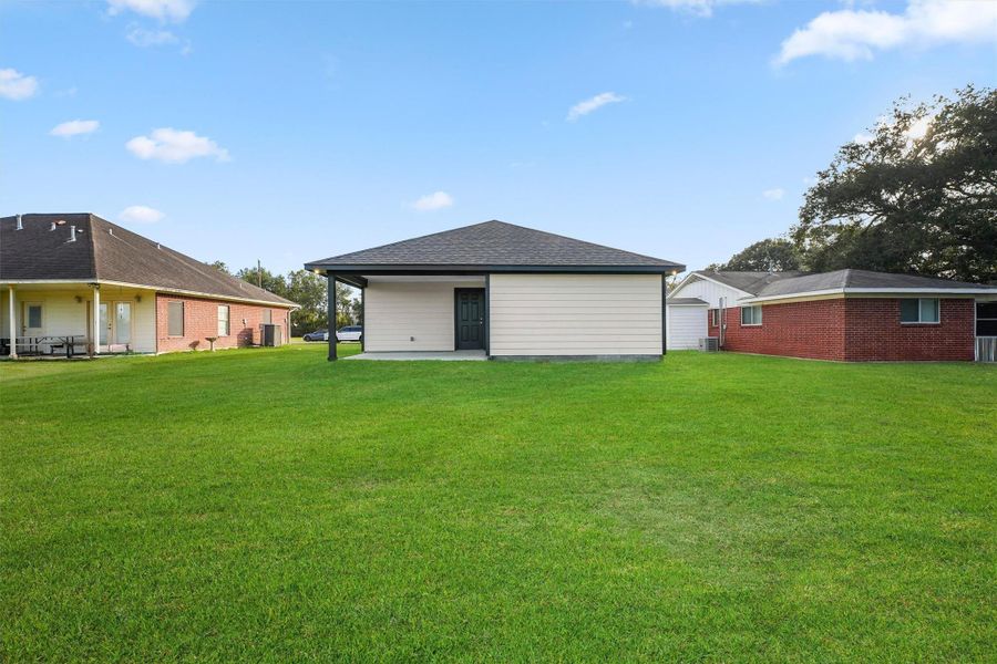 Front exterior of a new home in , Dayton, TX, highlighting curb appeal (Image 19).