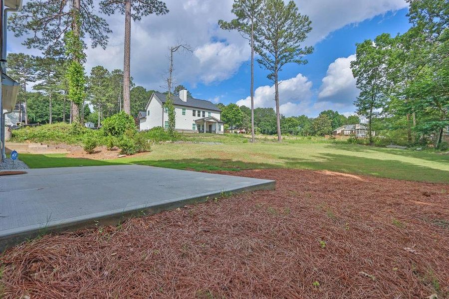 Front exterior of a new home in , Lawrenceville, GA, highlighting curb appeal (Image 2).