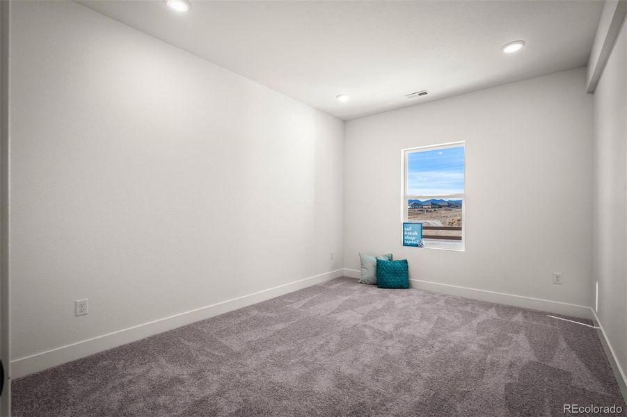 Spacious, unfurnished interior of a new home in Revel Crossing at Wolf Ranch - The Panorama Collection, Colorado Springs (Image 26).